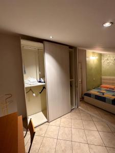 เตียงในห้องที่ Villetta a schiera a 5 minuti dal centro a piedi