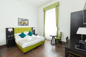 A bed or beds in a room at SuitInn19