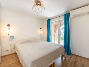 Posteľ alebo postele v izbe v ubytovaní Apartment Le Jasmin by Interhome