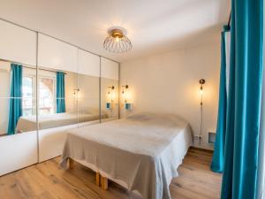 Posteľ alebo postele v izbe v ubytovaní Apartment Le Jasmin by Interhome