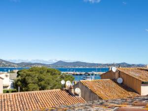 a view of the water from the roofs of buildings at Studio Rue Allard by Interhome in Saint-Tropez