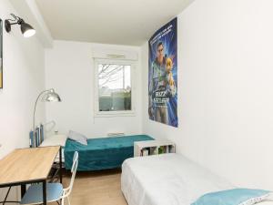 Łóżko lub łóżka w pokoju w obiekcie Apartment Les Caps Horniers by Interhome