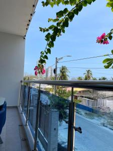 a balcony with a view of a street at Murano Hotel in Coveñas