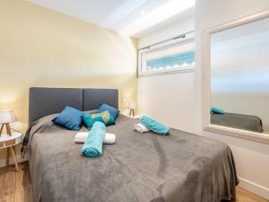 Posteľ alebo postele v izbe v ubytovaní Apartment Le Palladio by Interhome
