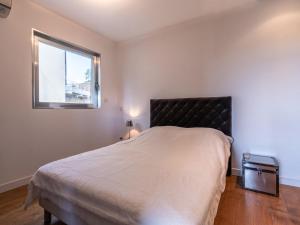 Posteľ alebo postele v izbe v ubytovaní Apartment Le Neptune by Interhome