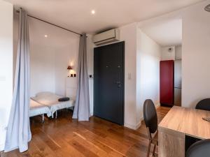 Posteľ alebo postele v izbe v ubytovaní Apartment Le Neptune by Interhome