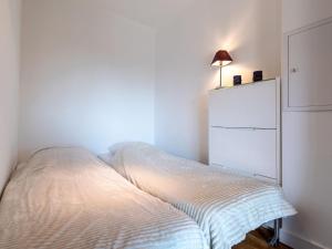 Posteľ alebo postele v izbe v ubytovaní Apartment Le Neptune by Interhome