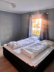 Ένα ή περισσότερα κρεβάτια σε δωμάτιο στο Super fresh appartement with garden WIFI EV Carger