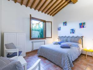 a bedroom with two beds and a window at Apartment Lavender by Interhome in Santa Luce