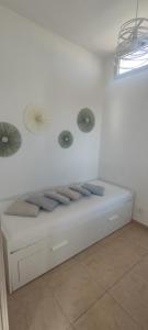 A bed or beds in a room at Stella Marina Holiday Home