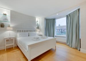 En eller flere senge i et værelse på The Cannons