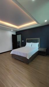 Postel nebo postele na pokoji v ubytování Hotel Cayuga