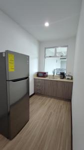 Kuchyň nebo kuchyňský kout v ubytování Hotel Cayuga