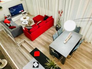 Ein Sitzbereich in der Unterkunft Apartamento El Remo