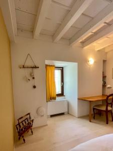 Cascina Bagaggera客房内的一张或多张床位
