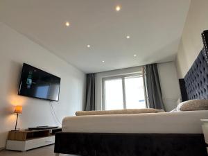 Ένα ή περισσότερα κρεβάτια σε δωμάτιο στο Cozy room with a balcony in Linz