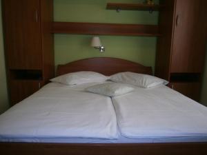 Postel nebo postele na pokoji v ubytování Guest House Palme