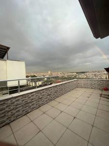 a balcony of a building with a view of a city at Golden horn view apartment 2 in Istanbul