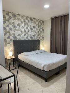 Кровать или кровати в номере San Paolo Guest House