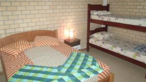 Postel nebo postele na pokoji v ubytování Residencial Campo Dunna + 51 fotografií