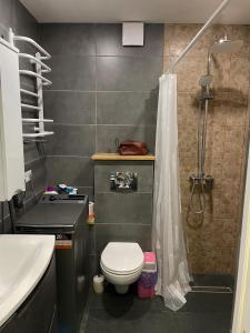 Ванна кімната в Hygge Apartment