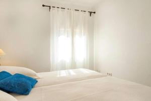 Postel nebo postele na pokoji v ubytování Del Mar 37