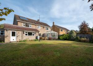 a house with a yard in front of it at Willow House in Halesworth