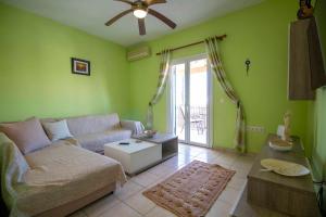A seating area at Casa Greca Vacation Home Acharavi Corfu
