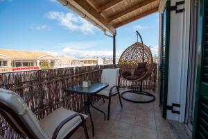 A balcony or terrace at Casa Greca Vacation Home Acharavi Corfu