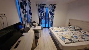 Katil atau katil-katil dalam bilik di Hosteria na Mazurach