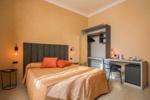 Postel nebo postele na pokoji v ubytování Hotel Tirrenia