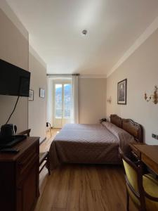 TV a/nebo společenská místnost v ubytování Hotel La Torre