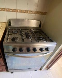 a stove top oven sitting in a kitchen at Jonas 5 in Hesston