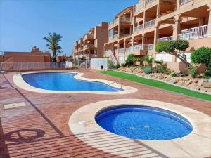 Bazén v ubytovaní Marina de la Torre alebo v jeho blízkosti