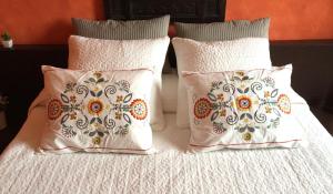 A bed or beds in a room at Hotel Villa San Fedele