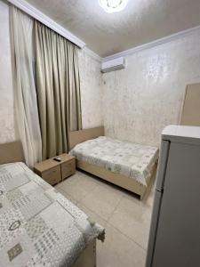 Postel nebo postele na pokoji v ubytování Hotell Anna Ureki + 37 fotografií