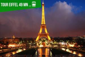 - une vue sur la tour Eiffel la nuit dans l'établissement AUBERVILLIERS COSY, à Aubervilliers