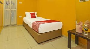 Postel nebo postele na pokoji v ubytování Juru Hotel