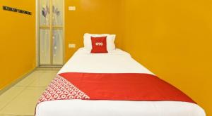 Postel nebo postele na pokoji v ubytování Juru Hotel