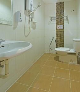 Koupelna v ubytování Juru Hotel