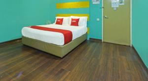 Postel nebo postele na pokoji v ubytování Juru Hotel