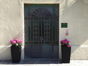 The facade or entrance of Hotel Villa San Fedele