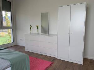 Postel nebo postele na pokoji v ubytování Wohnung am Fuße des Schwarzwalds