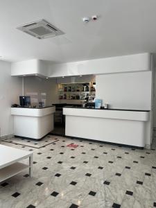 a room with a counter and a counter top at Hotel Exclusive in Riccione