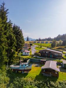 an aerial view of a small town with a boat at The Cabins at Alert Bay in Alert Bay