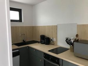 Kuchnia lub aneks kuchenny w obiekcie Maison Bertrand