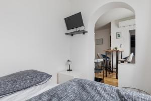 Et tv og/eller underholdning på Central Studio with private parking