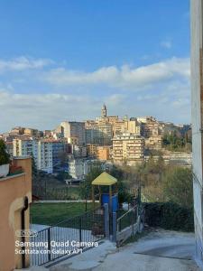 a view of a city with buildings and a playground at Delizioso appartamento Frosinone centro storico in Frosinone