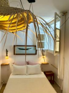 Postel nebo postele na pokoji v ubytování Hôtel Emeraude Essaouira