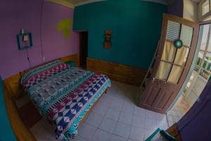 Krevet ili kreveti u jedinici u objektu Bichon La Casa Hostal